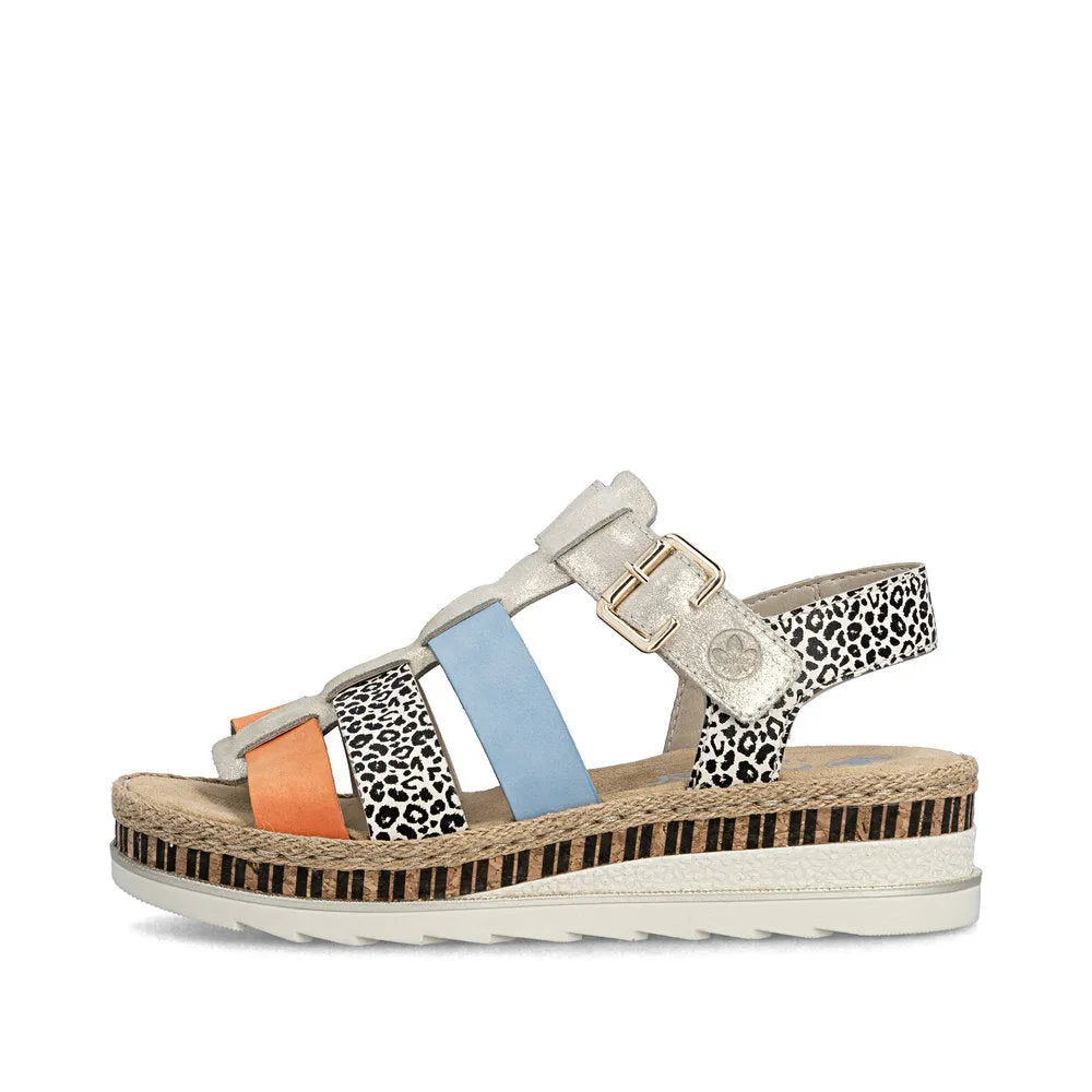 Rieker V7904-90 women's multi-color leather touch-fastening sandals with leopard print, espadrille-style wedge sole and adjustable straps.