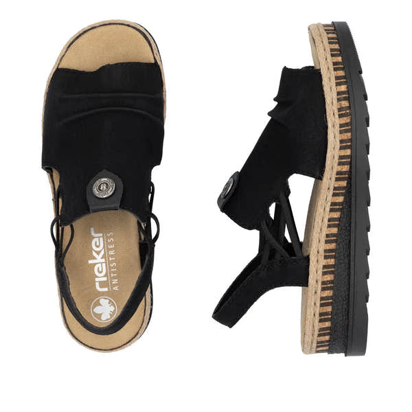 Rieker V7972-00 black pull-on sandals with fabric straps, cushioned insole, and a layered beige and black rubber sole.