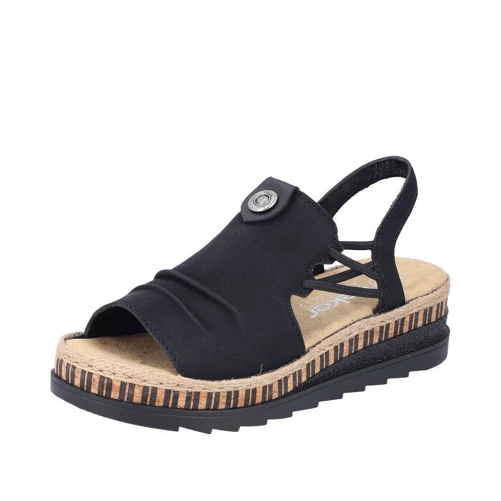 Black open-toe slip-on sandal with a loafer-style upper, slingback strap, and a cushioned espadrille sole with striped detail.