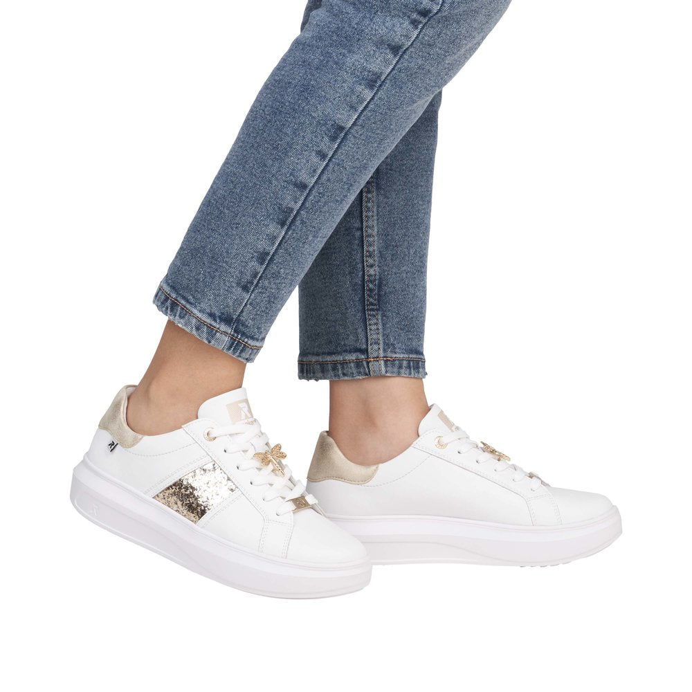Rieker W1202-82 women's white and metallic leather lace-up trainers with decorative accents and comfortable style.