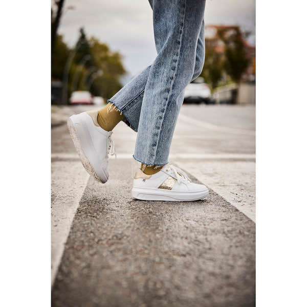Rieker W1202-82 white and metallic leather lace-up trainers for women, stylish casual footwear with gold accents.