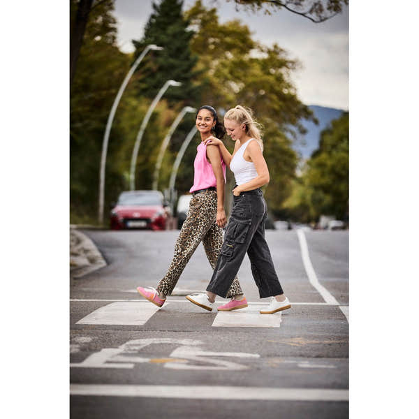 Rieker W1202-82 women's white and metallic leather lace-up trainers, stylish and comfortable footwear for casual wear.