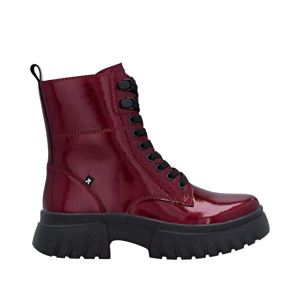 Rieker W1870-35 women's red patent leather ankle boots with lace-up and zip closure, chunky black sole, stylish and durable design.