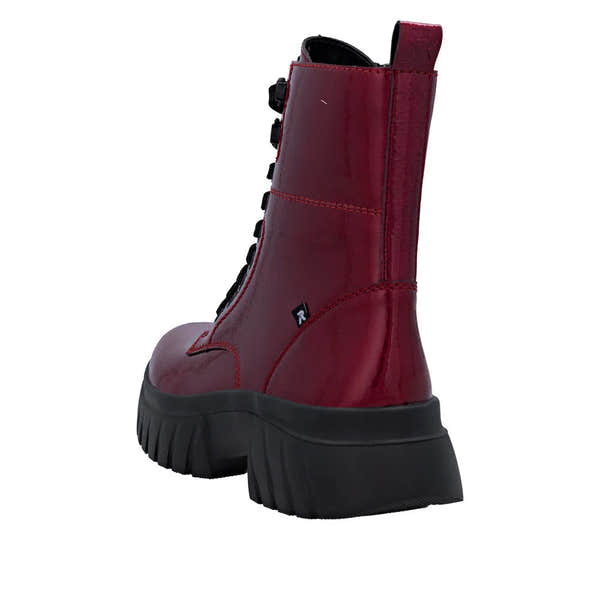 Rieker W1870-35 women's red patent leather ankle boots with zip and lace-up front, chunky black sole, stylish and trendy footwear.