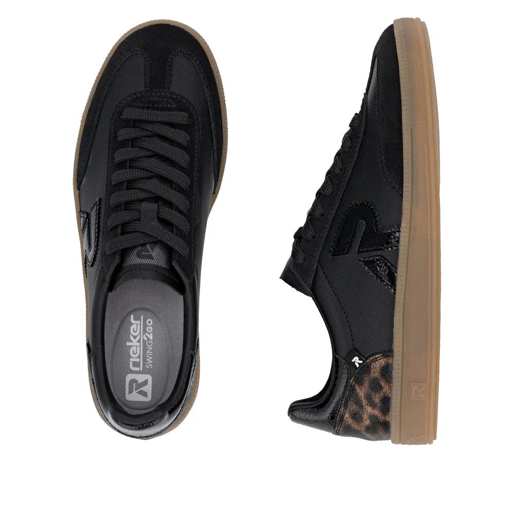 Black leather lace-up trainers for women with leopard print accents and gum sole, Rieker W2200-03.