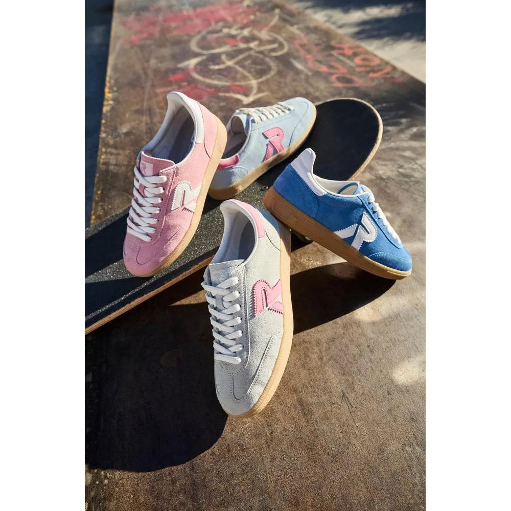 Light blue and pink suede lace-up trainers with white and pink accents, rubber soles, and a sporty style.