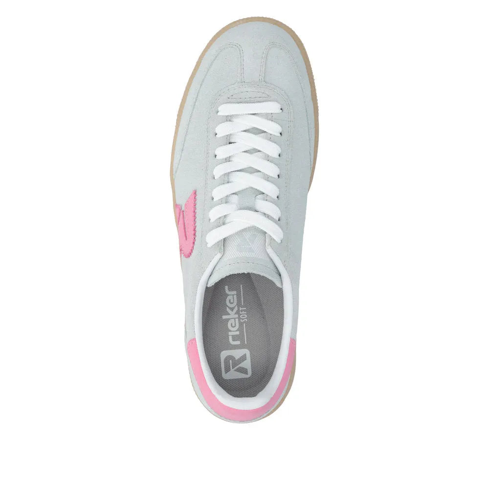 White and mint green suede lace-up trainers with pink accents and a beige sole, featuring branding on the insole.