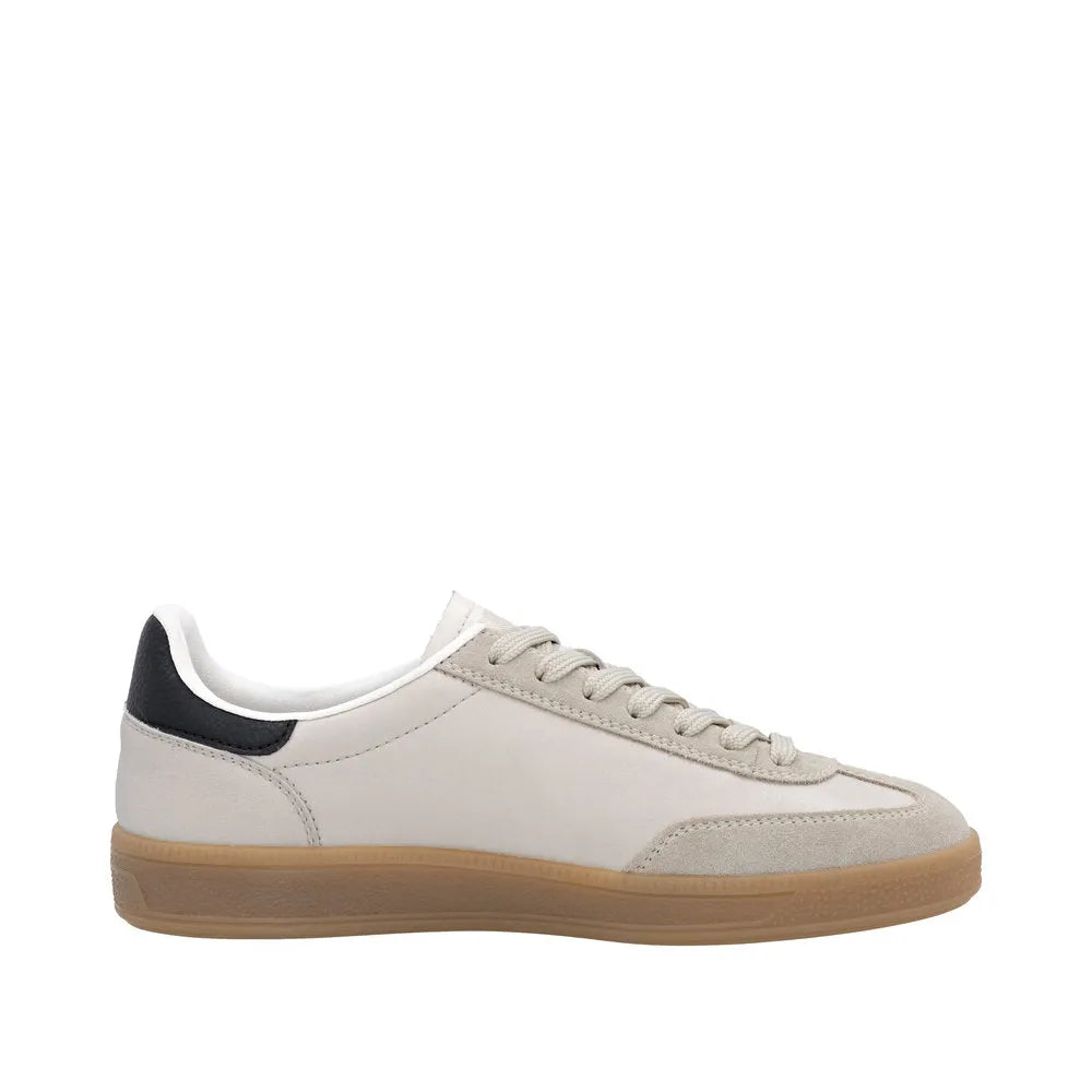 Rieker W2200-60 ladies wide fit beige suede lace-up trainers with black heel accents and gum sole.