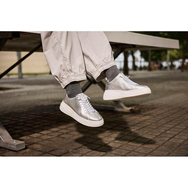 Rieker W2301-90 women's silver leather lace-up sneakers, stylish high-top shoes with white soles and casual design.