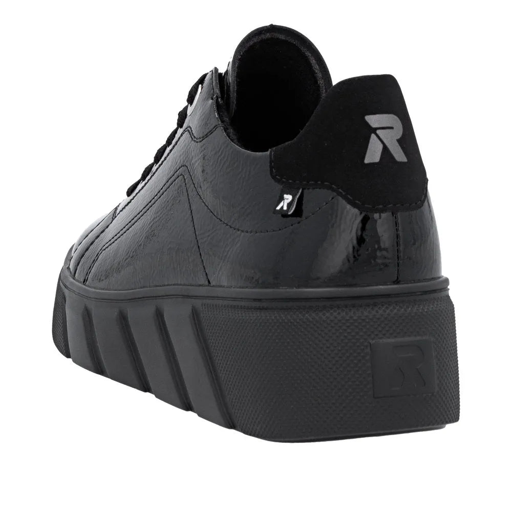 Rieker W2601-00 Ladies Black Patent Leather Lace-Up Sneakers with chunky sole and logo detail.