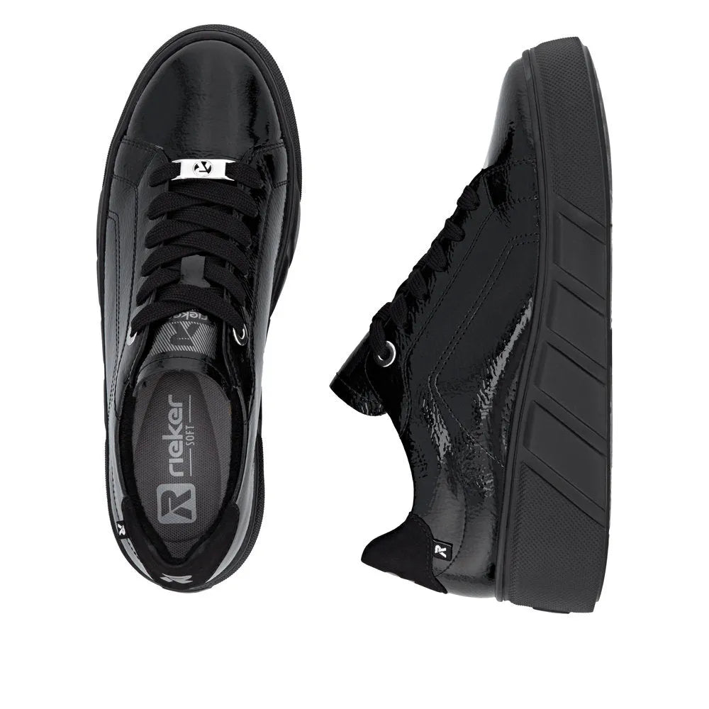 Rieker W2601-00 women's black patent leather lace-up trainers with chunky sole and sleek finish.