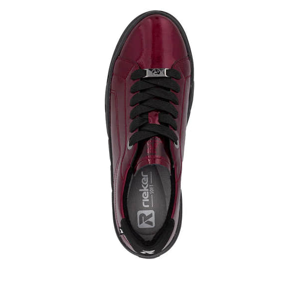 Rieker W2601-35 ladies red patent leather lace-up trainers with black laces and cushioned interior.