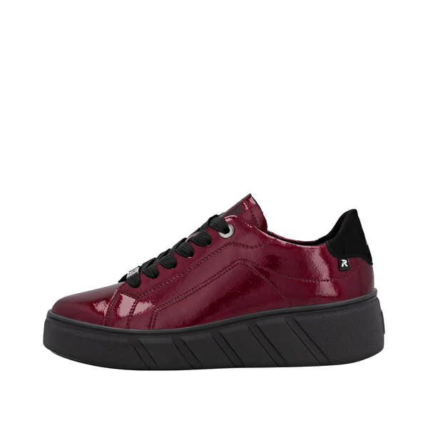 Rieker W2601-35 Ladies red patent leather lace-up trainers with black sole and accents.