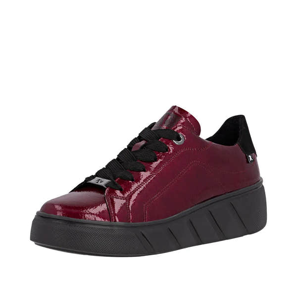 Rieker W2601-35 women's red patent leather lace-up trainers with platform sole and black laces.