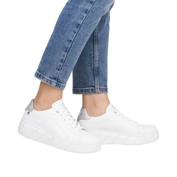 Rieker W2601-80 women's white leather lace-up trainers with silver heel accents and thick sole, casual athletic footwear.