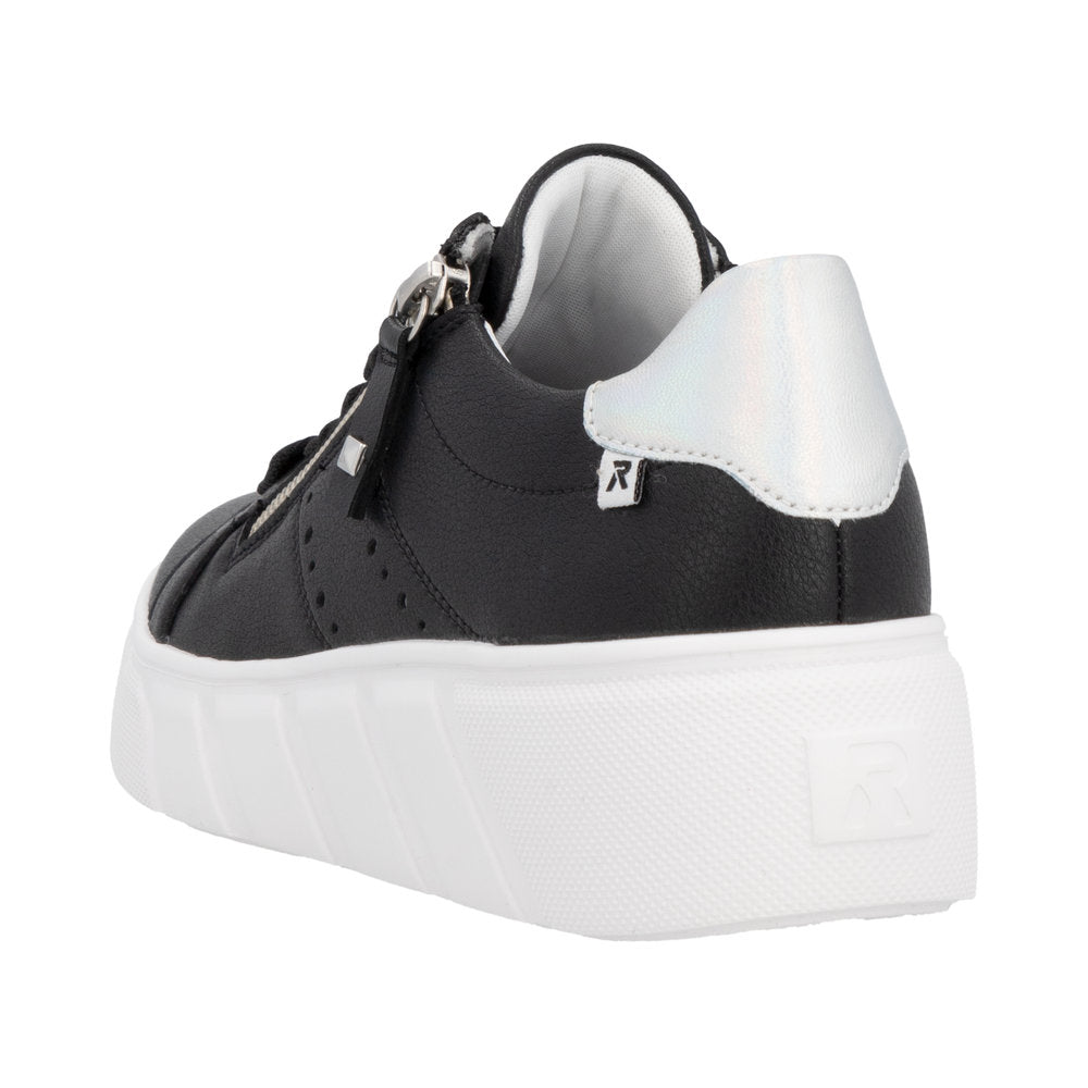 Rieker W2605-00 women's black leather sneakers with white heel detail, zip and lace closure, and thick white sole.