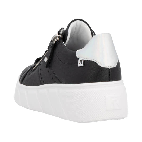 Rieker W2605-00 women's black leather sneakers with white heel detail, zip and lace closure, and thick white sole.