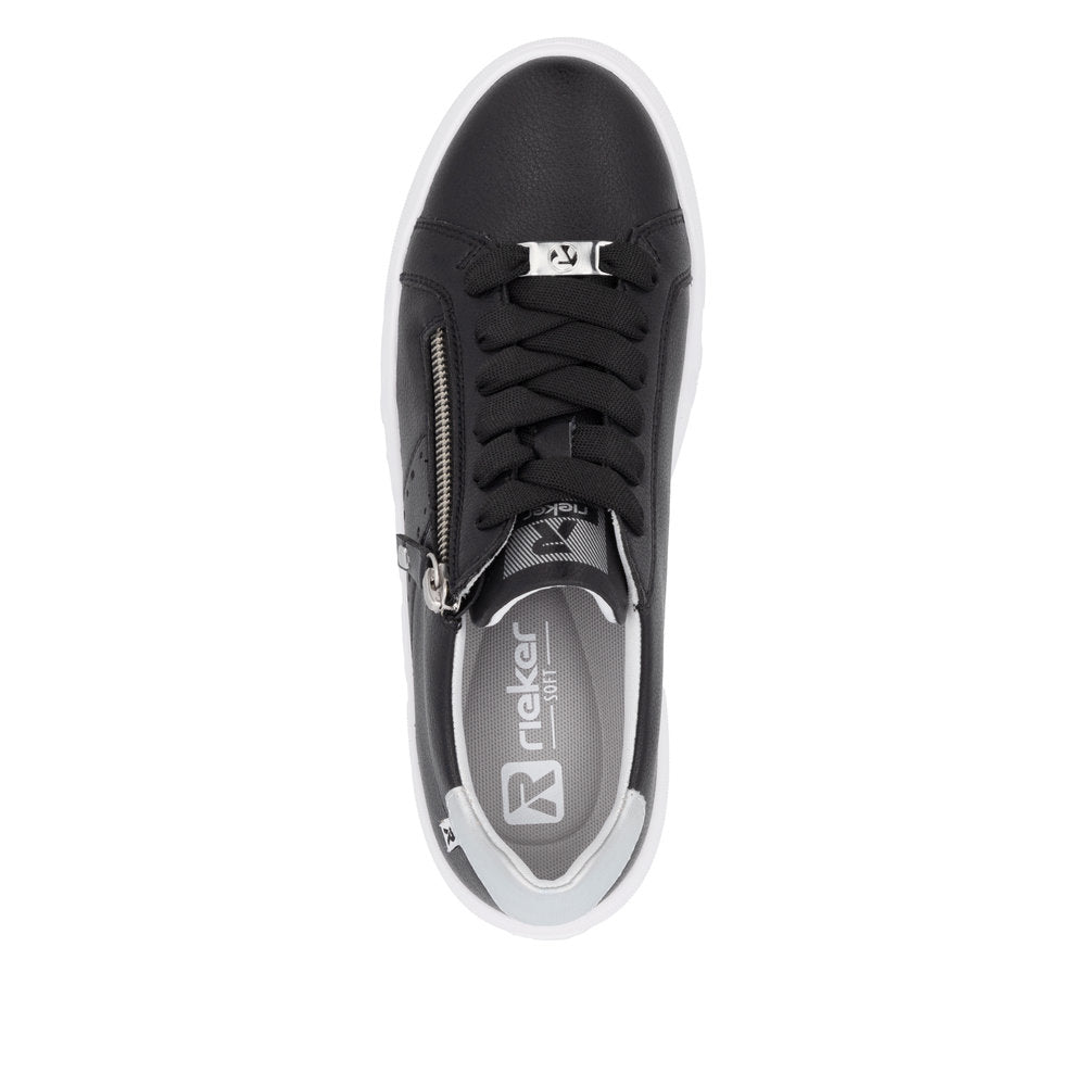 Rieker W2605-00 women's black leather casual sneakers with zip and lace-up closure, white sole, and metallic logo details.