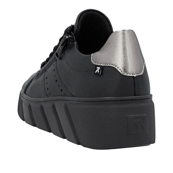 Rieker W2605-02 women's black leather trainers with zip and lace-up closure, featuring silver heel detail and chunky sole.