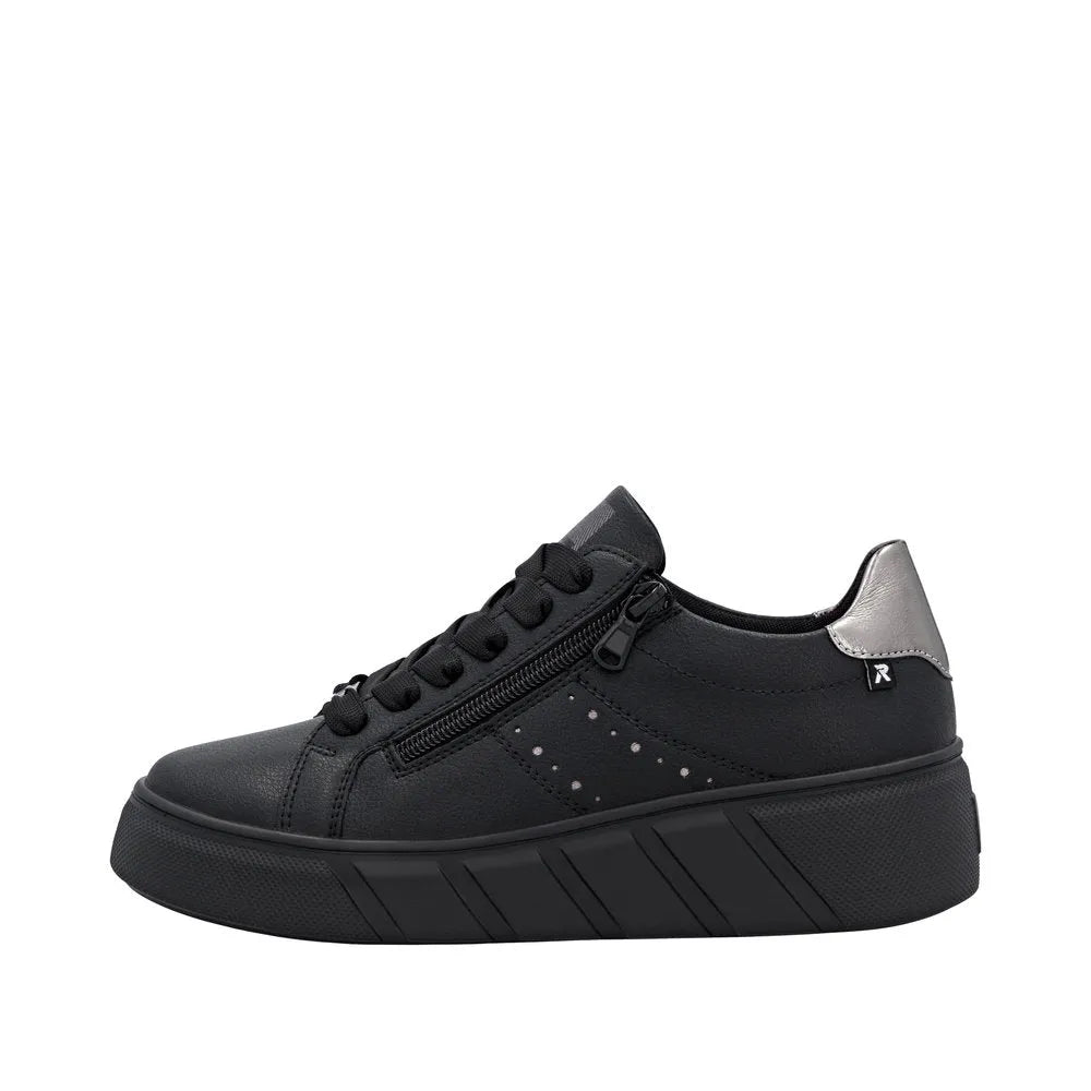 Rieker W2605-02 women's black leather trainers with zip and lace-up design, chunky sole, and metallic silver heel detail.
