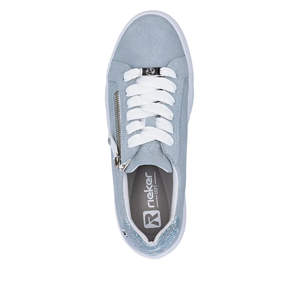 Light blue suede women's sneakers with white laces, zip detail on side, and black logo tab at tongue.