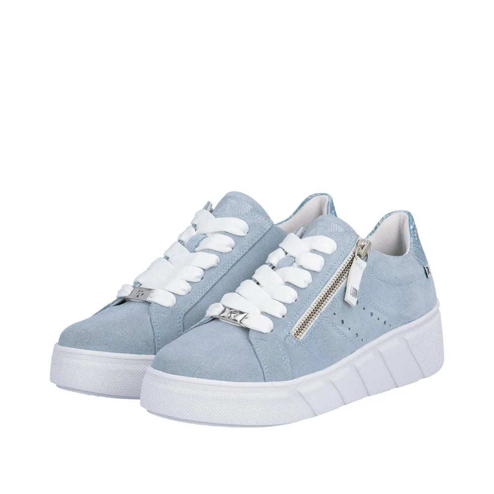 Light blue suede sneakers with white laces, side zipper, sporty design, and thick white sole.