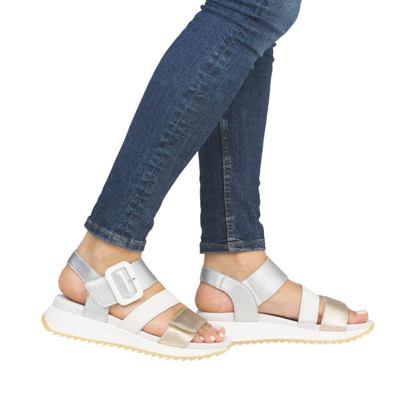 Rieker W2950-90 Ladies Gold/White Leather Touch Fastening Sandals with adjustable straps and chunky sole.