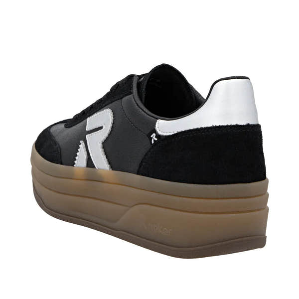 Rieker W3700-00 women's black leather lace-up trainers with chunky beige sole and white accents.