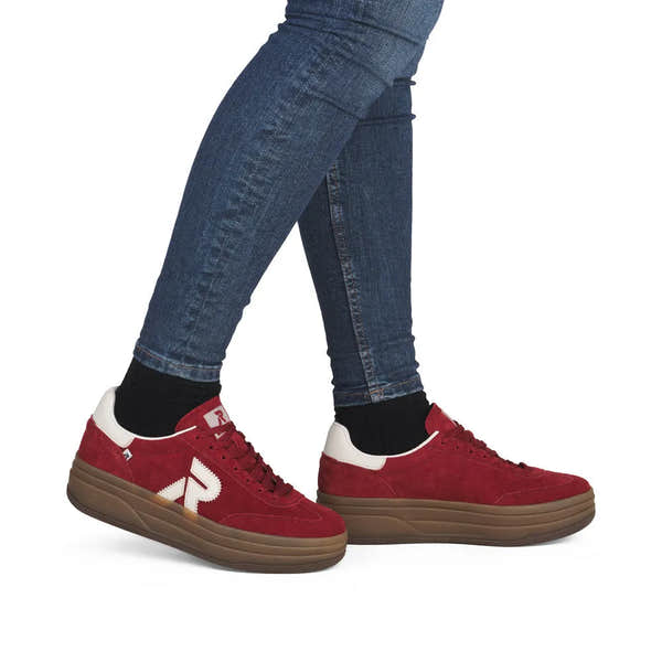Rieker W3700-35 women's red suede lace-up trainers with white accents and chunky brown soles.