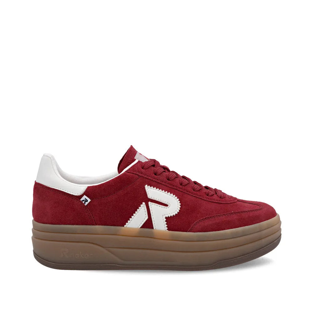 Rieker W3700-35 women's red suede lace-up trainers with a chunky tan sole and white accents.