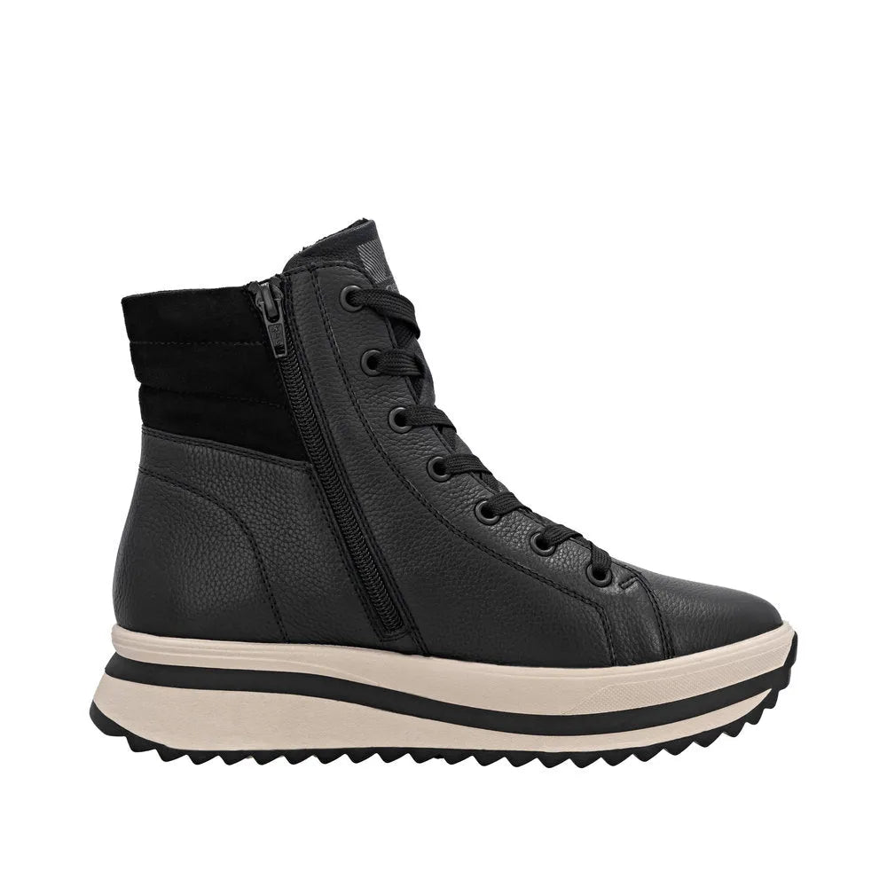 Rieker W3870-00 women's black leather ankle boots with zipper and lace-up detail, chunky sole, and cushioned heel.