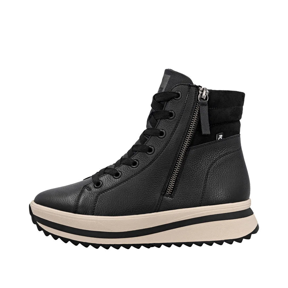 Rieker W3870-00 women's black leather ankle boots with zip, lace-up design, and chunky rubber sole.