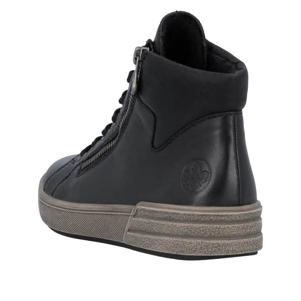 Rieker X0709-01 women's black leather ankle boots with zip and lace-up detail, padded collar, and rugged sole.
