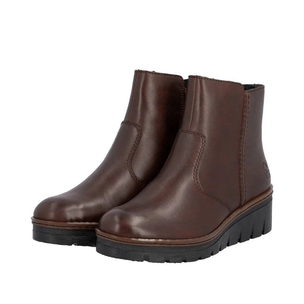 Rieker X9165-27 women's brown leather ankle boots with side zip, chunky heel, and cushioned sole.