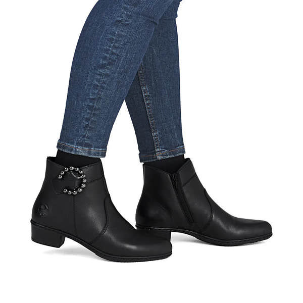 Rieker Y0797-00 women's black leather ankle boots with side zipper and decorative buckle, low heel, stylish footwear.