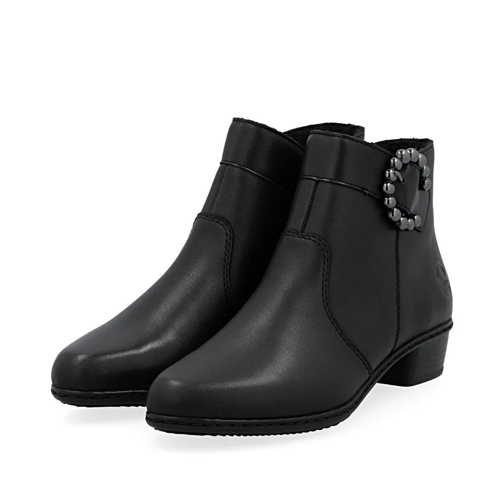 Rieker Y0797-00 ladies black leather ankle boots with side zip and decorative buckle, mid-heel, stylish and comfortable footwear.