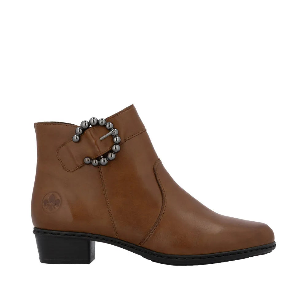 Rieker Y0797-24 women's brown leather ankle boot with side zip and decorative buckle featuring silver beads.