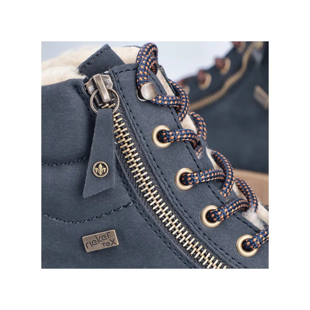 Rieker Y6104-14 women's blue water-resistant ankle boots with lace-up and zip closure, featuring fur lining and metal eyelets.