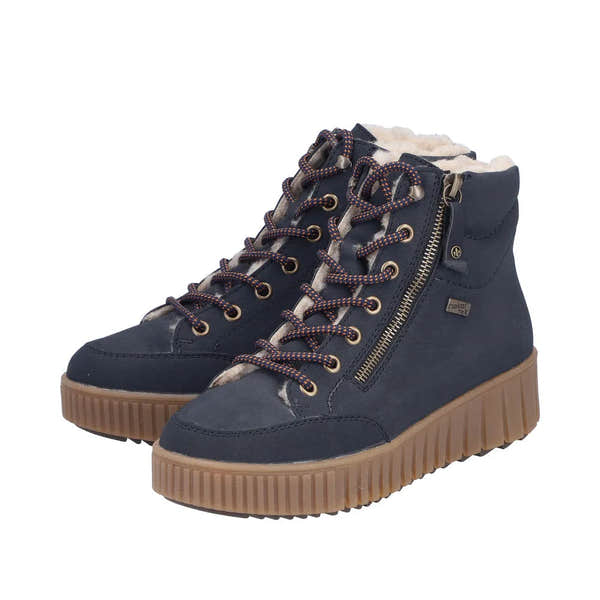 Rieker Y6104-14 women's blue water-resistant ankle boots with zip, lace-up front, shearling lining, and rubber sole.