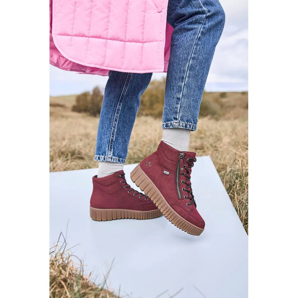 Rieker Y6104-35 women's red water-resistant ankle boots with zip and lace-up closure, off-road sole.