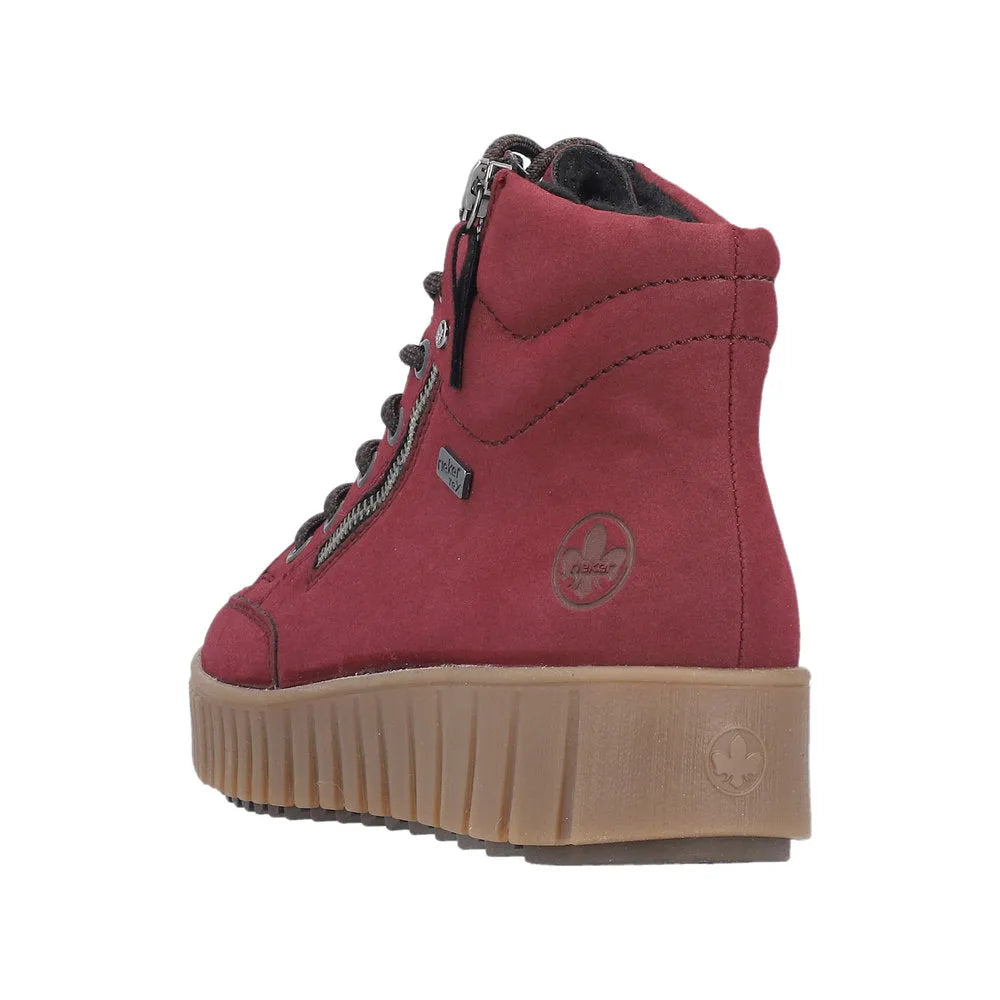 Rieker Y6104-35 women's red water-resistant ankle boots with zippers and lace-up design, featuring a chunky beige sole.