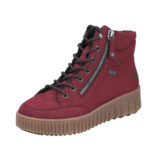 Rieker Y6104-35 women's red water-resistant ankle boots with side zipper, lace-up front, and chunky outsole.