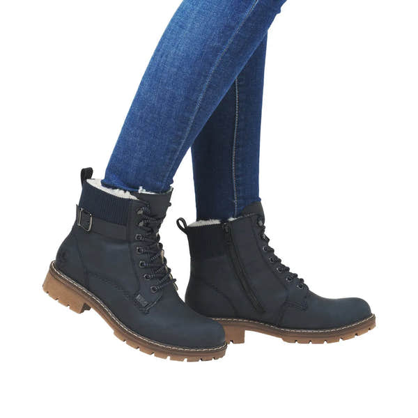 Rieker Y9102-14 ladies blue water-resistant ankle boots with lace and zip closure, faux fur lining, and rugged tan sole.