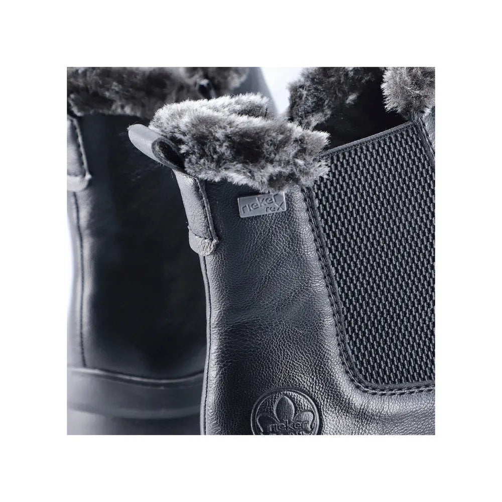 Rieker Z0061-00 women's black water-resistant ankle boots with side zip and faux fur lining.