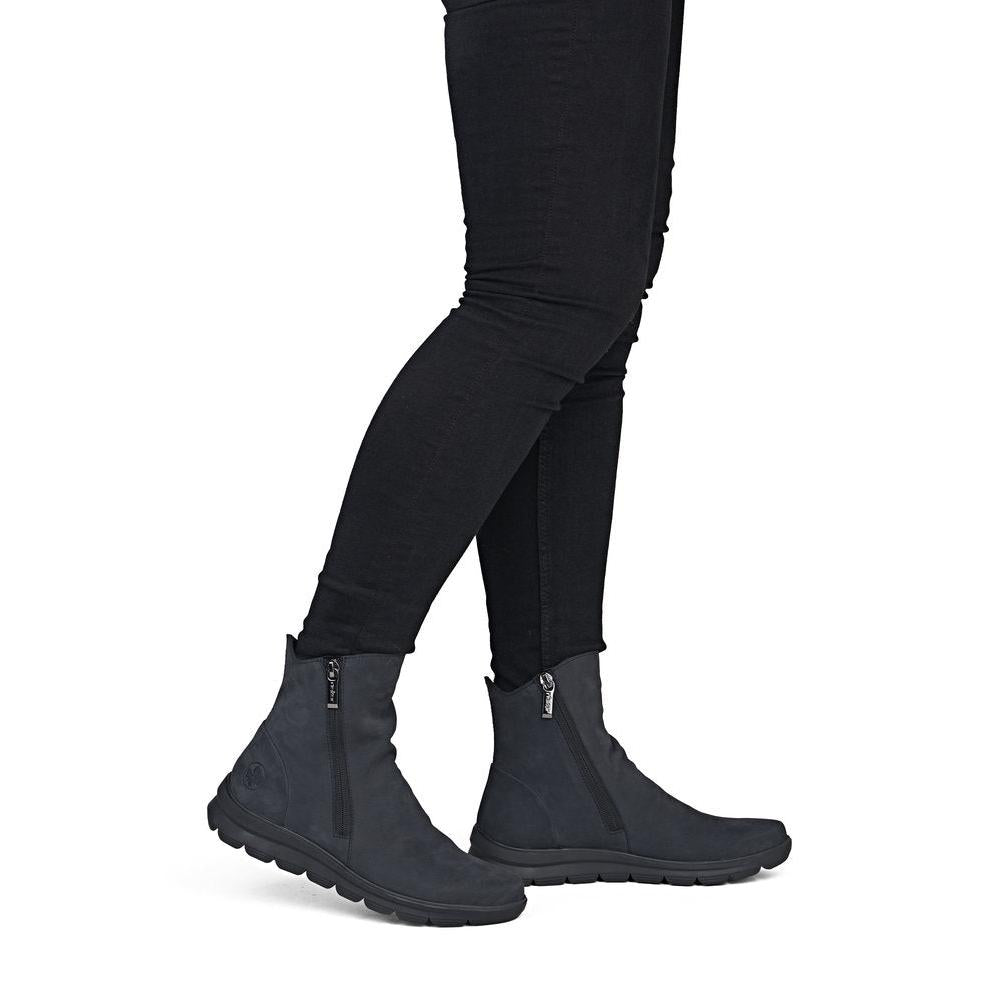 Rieker Z0068-14 women's navy suede side zip ankle boots, on-foot lifestyle view.