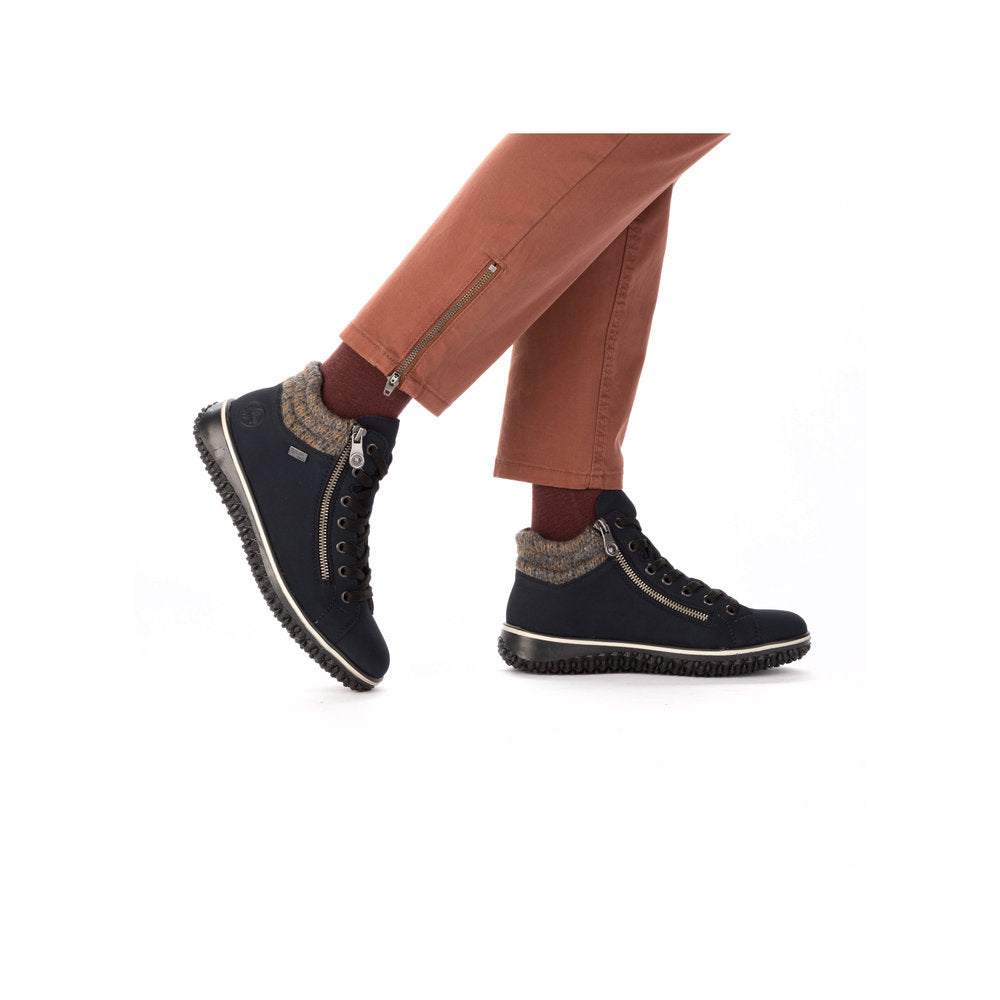 Rieker Z4263-14 women's blue water-resistant ankle boots with zip and lace-up design, chunky sole, and furry ankle detail.