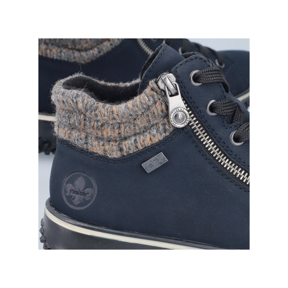 Rieker Z4263-14 women's blue water-resistant ankle boots with zip and lace fastening, featuring a cozy knit collar and embossed logo.
