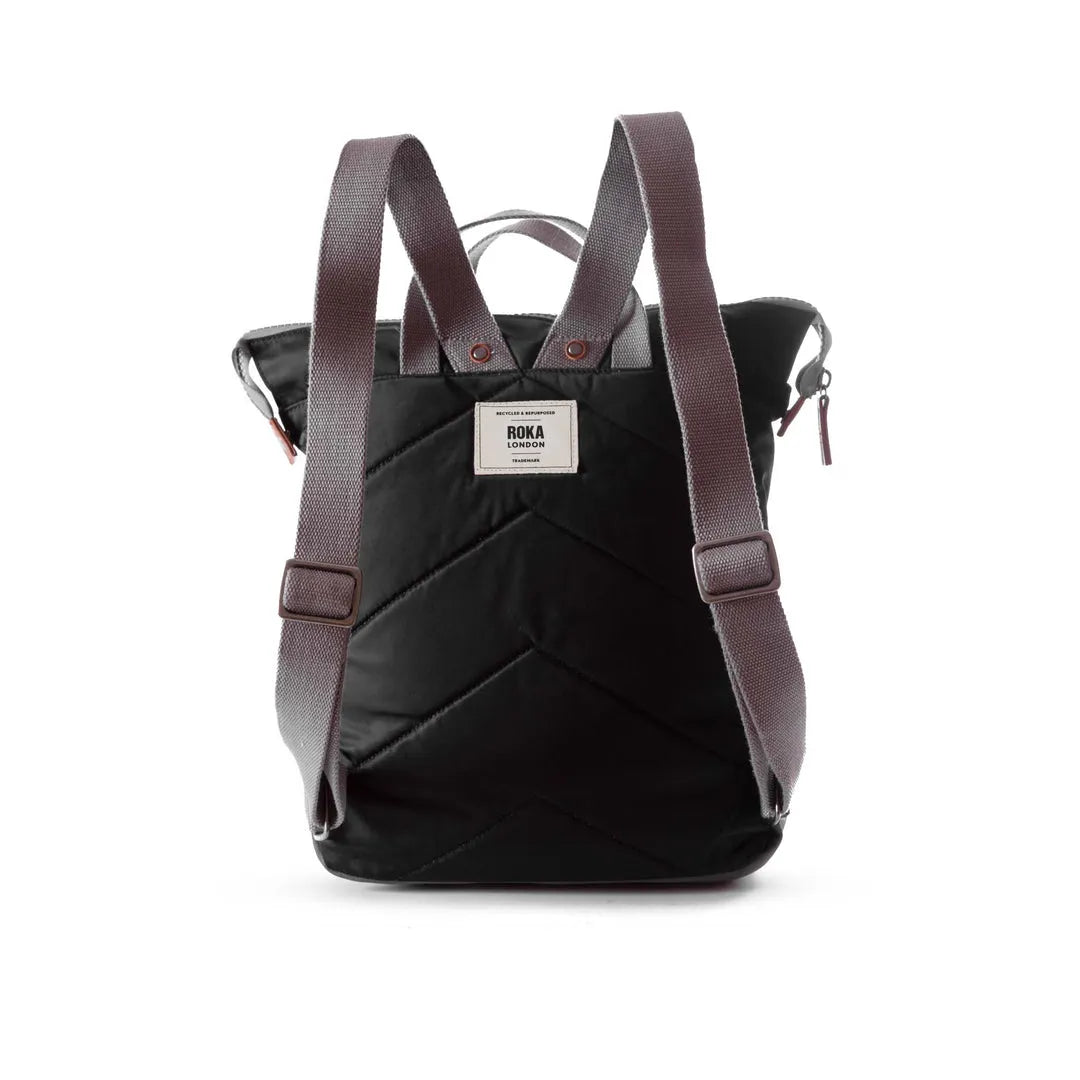 Roka Bantry B Black recycled nylon backpack with adjustable straps and zip closure, eco-friendly design.
