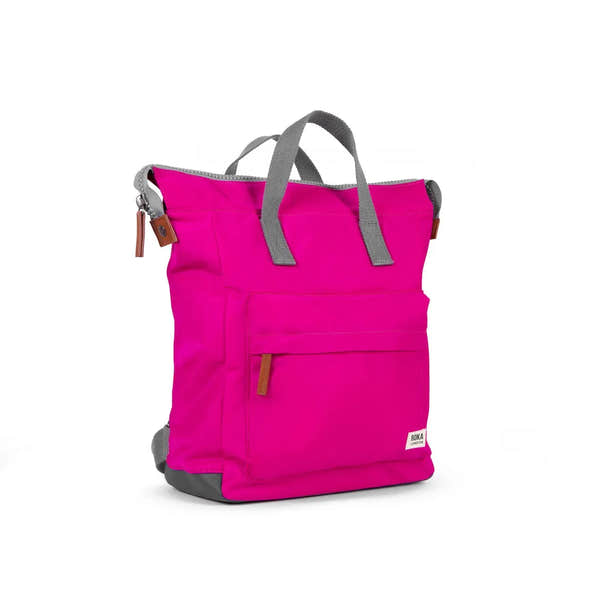 Roka Bantry B Candy recycled nylon tote bag in bright pink with gray handles and accents, featuring front pocket and leather zipper pull.