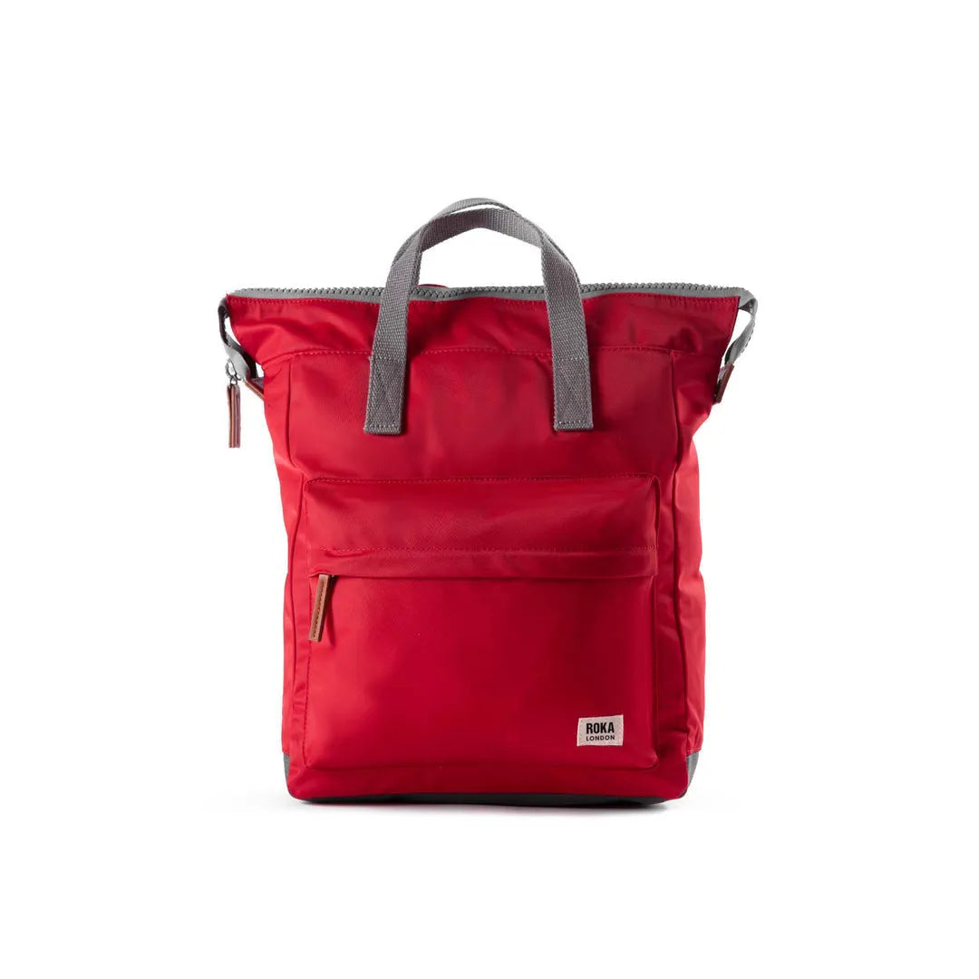 Roka Bantry B cranberry organic recycled nylon tote bag with gray handles and front zip pocket.